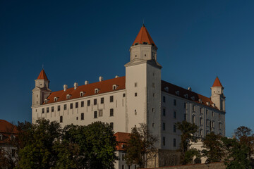 Fototapeta na wymiar Bratislava castle in summer hot evening with blue sky in Slovakia