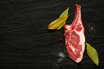 Red meat. Lamb chops on black background