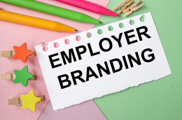 Employer Branding. Conceptual photography promoting the selection of the employer of the company for the desired target group. colorful background, clothespins, text on white paper