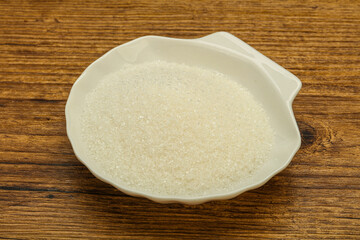 White sugar in the bowl