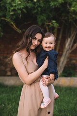 Portrait of happy mother and little smilling daughter