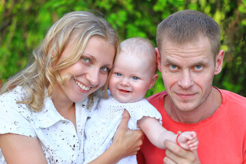 Fototapeta premium Dad and daughter in the park. Portrait of dad and child.