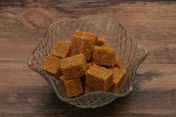 Cane sugar cubs in the bowl