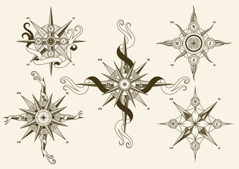 Collection of vintage nautical compass. Old vector design elements for marine theme and heraldry. Hand drawn wind roses