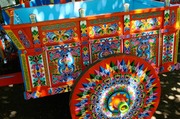 Full size painted oxcart ready for delivery in yard of crafstman in Sarchi Costa Rica