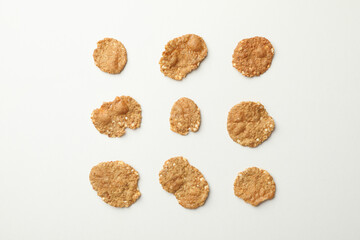 Flat lay with muesli on white background