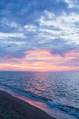 beautiful sunrise at sea with clouds