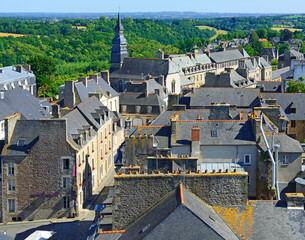 Dinan rooftops and Chapel of the Benedictine. Dinan is a walled Breton town and first-class tourist...