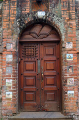 Doorway in Barrio Amon San Jose Costa Rica with tiles of Don Quixote