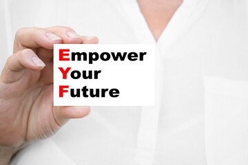 THE GIRL holds the card Empower Your Future Business concept