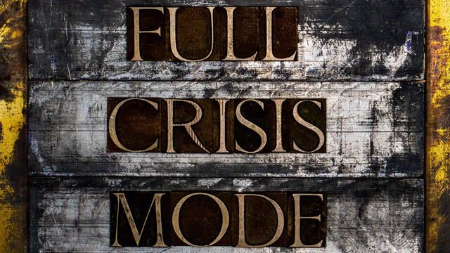 Full Crisis Mode animated digital glitch text formed with real authentic typeset letters on vintage textured silver grunge copper and gold background