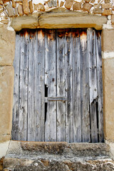 old door in a ruined house
