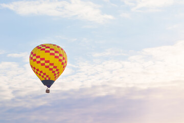 Hot air balloon in the sky in summer, banner
