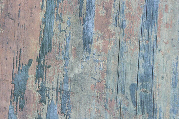 Grunge wall with cracks and peeling paint. Textured background. Old Wood texture