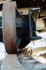 Detail shots of the runner and gear wheel of an old, rusty harbour crane