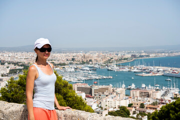Fototapeta na wymiar Mallorca island. Young beautiful woman in Palma city.