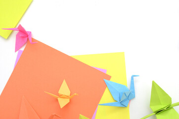 Folded origami paper birds background