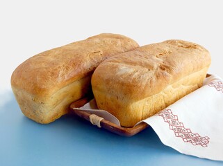 loaf and slices of tasty homemade bread 