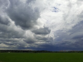 storm clouds over the field