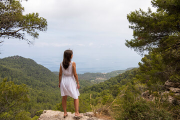 Naklejka premium Mallorca island. Young woman in Mallorca mountains.
