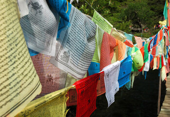 Juizhaigou (Nine Villages Valley), Sichuan, China. Colorful Tibetan prayer flags. Juizhaigou is a popular tourist destination in China famous for its waterfalls, lakes and Tibetan heritage.