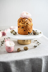 Easter composition with cake, eggs and flowers. Easter holiday concept
