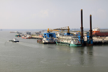 ships moored at the pier in a shipyard