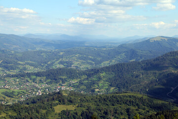 Obraz premium small village in the mountains in summer