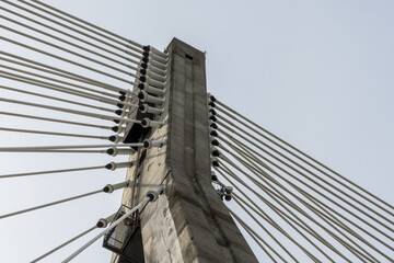 Lines holding bridge span close-up view photo
