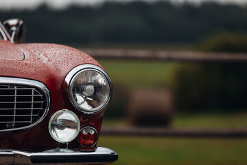 Fototapeta premium Old classic car front headlight