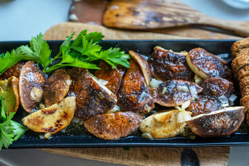 Gourmet boletus roasted in butter. Fresh cooking at home. Fall harvests - forest mushroom.