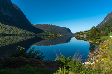 Naklejka na ściany i meble Gorgeous, mountain lake and fjord scenery along the Gaular River Valley, Sunnfjord, Vestland, Norway