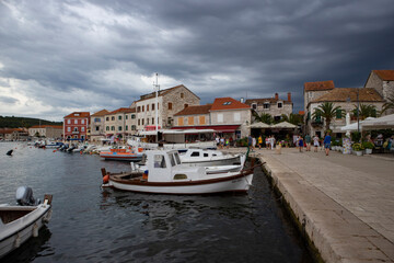 Fototapeta premium Stari Grad/Croatia-August 7th,2020: Rain storm approaching over oldest town on the Hvar island