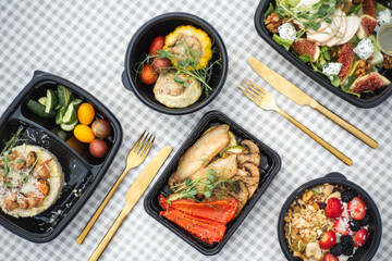 Sat of take away boxes with healthy food on the table. Restaurant dishes. Flat lay