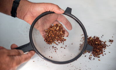 Processing plant seeds with sieve
