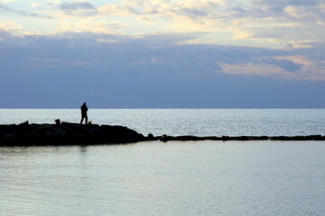 Fisherman in the beautiful sunset light