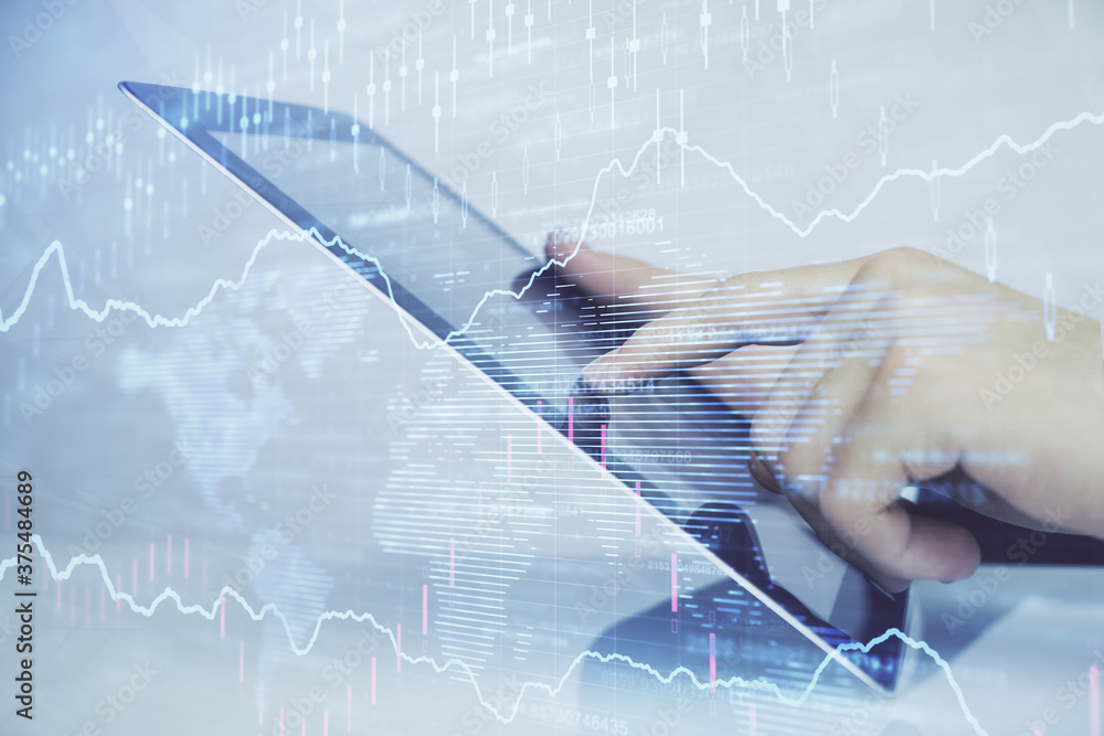 Poster multi exposure of man's hands holding and using a digital phone and forex graph drawing. financial m
