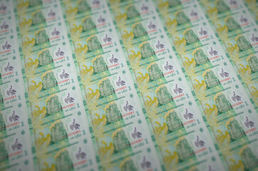 1 Romanian leu bills printed in illegal money production conveyor. Collage of many fake bills....
