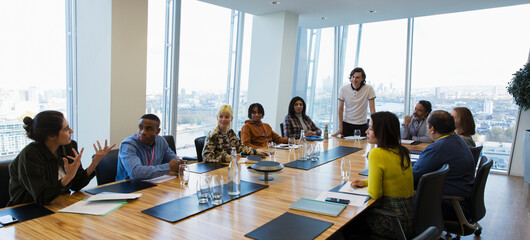 Business people talking in conference room meeting