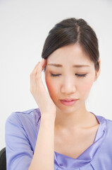 Fototapeta premium 頭痛のＯＬ