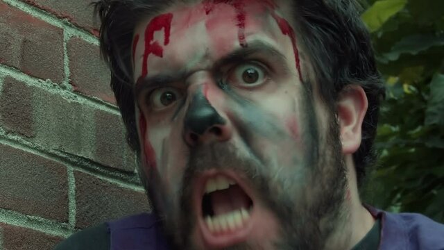 angry zombie face up close