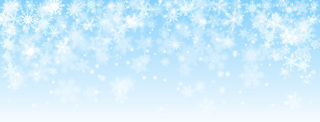 Naklejka na ściany i meble Christmas background of falling snowflakes in light blue colors