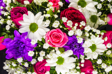 Background for a greeting card - beautiful gift bouquet of various colorful decorative summer flowers