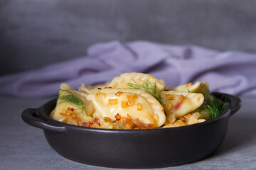 Dumplings, filled with potato. Varenyky, vareniki, pierogi, pyrohy - dumplings with filling