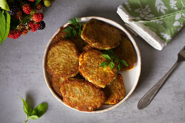 Potato cakes. Vegetable fritters, pancakes, latkes, draniki - popular dish in many countries. View from above, top studio shot