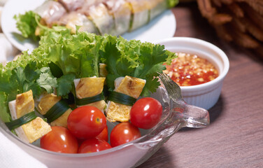 Colorful and healthy salad roll with fresh tomato
