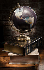 old globe on old book