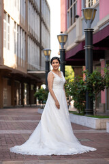 Fototapeta premium Latino Bride posing with sleeveless wedding dress portrait