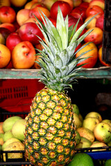 Fruit stand with pineapples, mangos and limes in Costa Rica