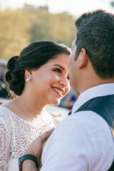Fototapeta premium Latino Bride close up looking at groom into his eye